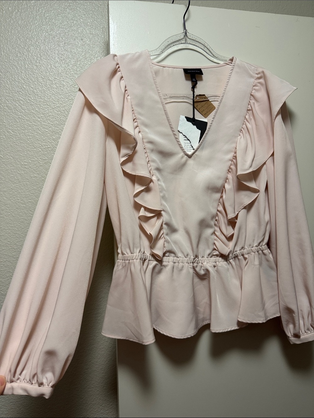 Light Pink Ruffle V-Neck Peplum Blouse